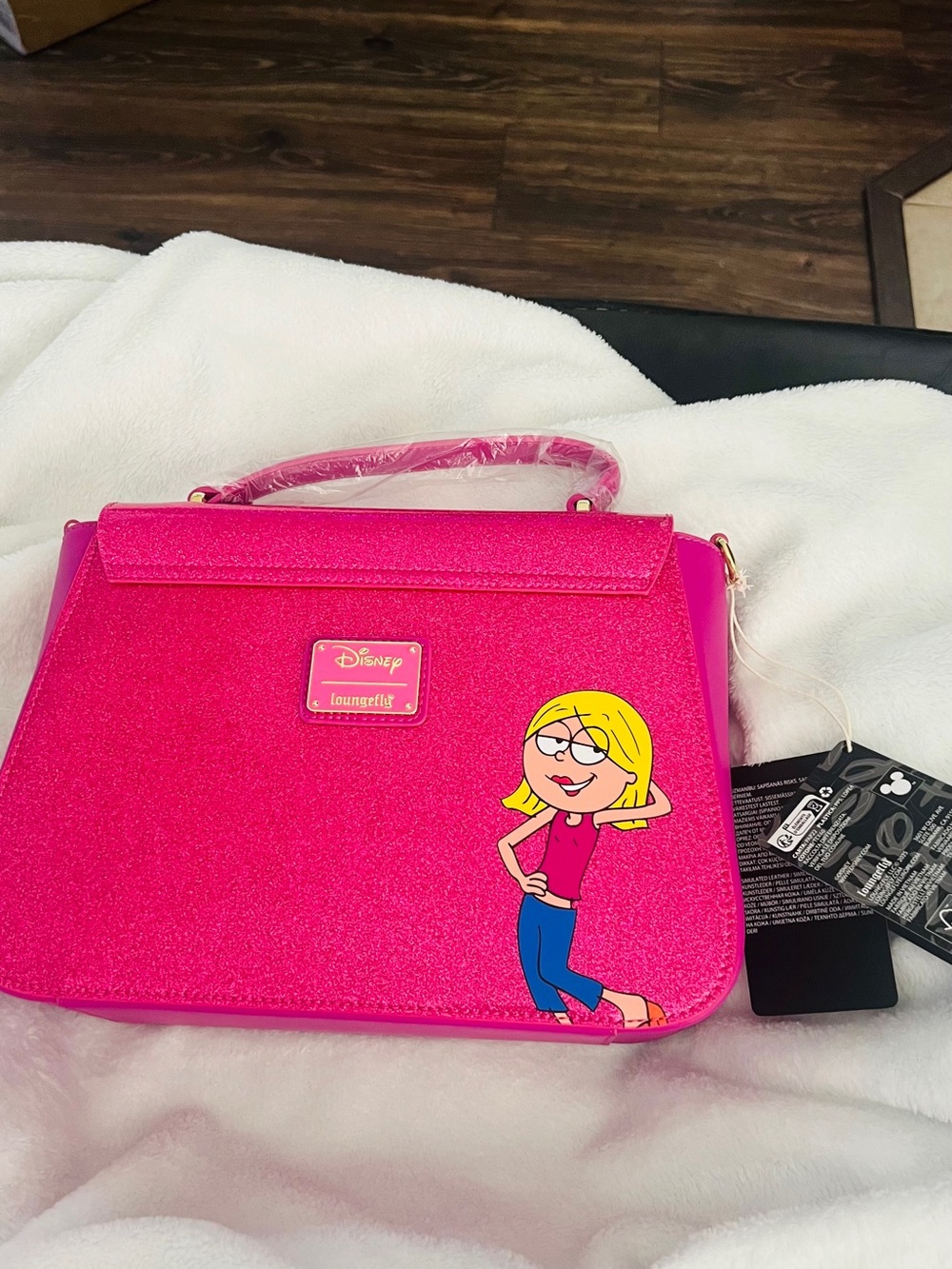 DISNEY LIZZIE MCGUIRE
FLORAL APPLIQUE GLITTER Loungefly with crossbody strap. - Picture 2 of 6